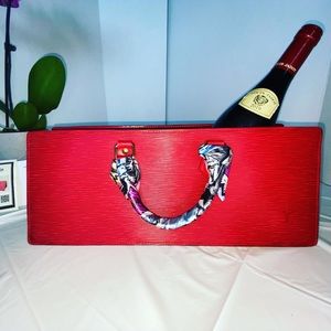Epi sac triangle red Louis Vuitton